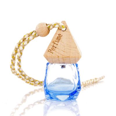 China Wooden Gift 10ml Empty Car Perfume Bottle Glass Hanging for sale