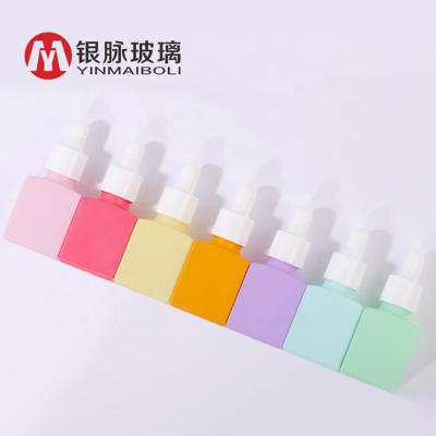 China Essential Oil Cosmetic Luxury Cosmetic Bottle Packaging 15ml Square Empty Dropper Oil Bottle for sale