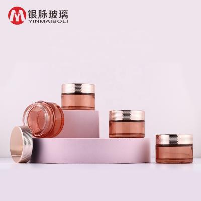 China Personal Care Cosmetic 30ml Rose Gold Light Blue Green Glass Jar With Honeycomb Ring Lid For Face Cream for sale