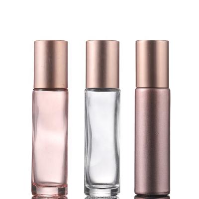 China Hot Selling Personal Care Perfume Essential Oil 10ml Pink Clear Glass Bottle With Rose Gold Foil Cap for sale