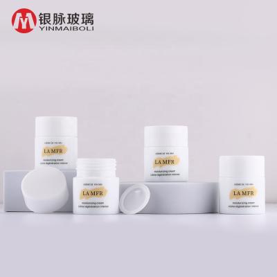 China Wholesale china facial cream white glass personal care jar 30g cosmetic cream jars for skin care products for sale