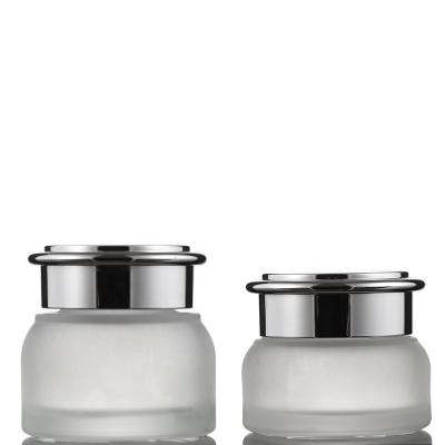 China Personal Care 30g 50g Frosted Glass Jar Skin Care Glass Bottle Cosmetic Packaging With Silver Cap for sale