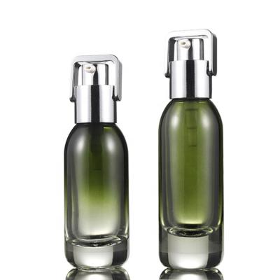 China Personal Care Wholesale 40Ml 50Ml Green Glass Cosmetic Packaging Sets Empty Bottle For Skin Care Lotion for sale