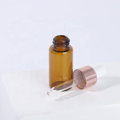 China Personal Care Dropper Pipette Bottle Small Amber Clear Glass Vial For Essential Oil Serum With Rubber Dropper Cap for sale