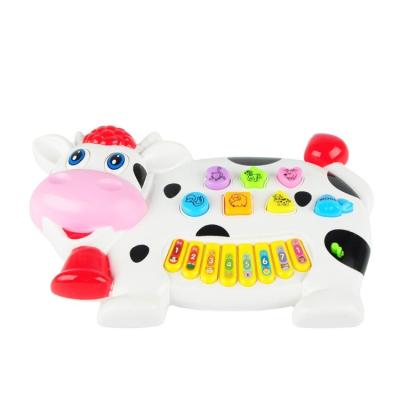 China Battery Operated Toy Hot Selling Cute Cow Design Electric Organ Keyboard Educational Toys for sale