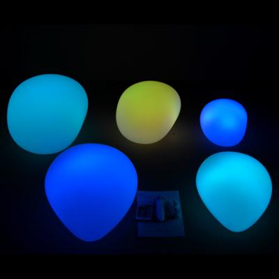 China Morden Stone Stepping LED Pebble Lights Christmas Decoration Solar LED Stone Lights Solar Garden Ball Light for sale