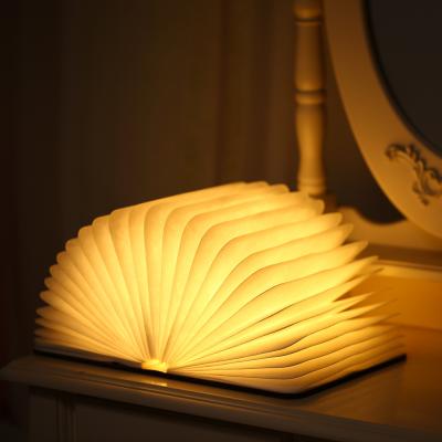 China Real Wood 2000mah Battery Radio Table Lamp DC5V USB Modern Portable Desk Book Shape 7 LED Light Variable Decorative Lights for sale