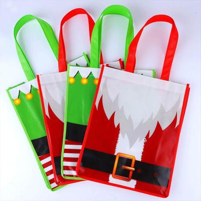 China Handled Present Nonwoven Bag Santa Claus Party Bag Nonwoven Suit Prints Gift Bags Elves Nonwoven Holiday Christmas Treat Bag for sale