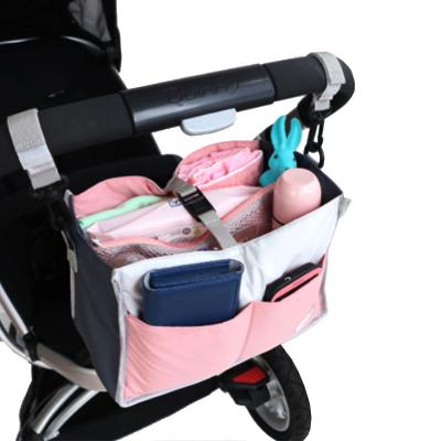 China Water Resistant Diaper Bag Hanging Baby Carriage Organizer Bag Multi-compartments Lace Large Nylon Diaper Bag for sale