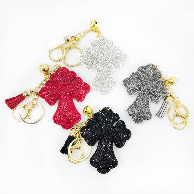 China Korean Velvet Alloy Rhinestone Customized Diamond Bag Creative Hot Car Hanging Key Chain Cross Hanging Pendant for sale