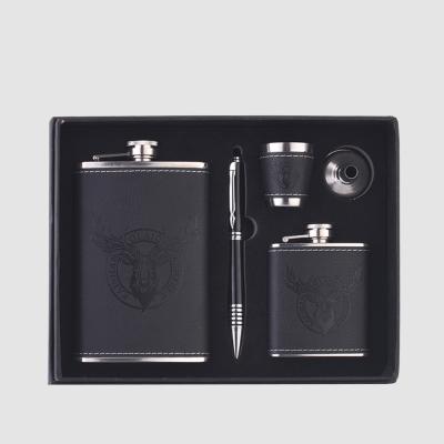 China Minimalist Personality Engraved Circle Shape Stainless Steel Mini Hip Flask Whiskey Flask Set for sale