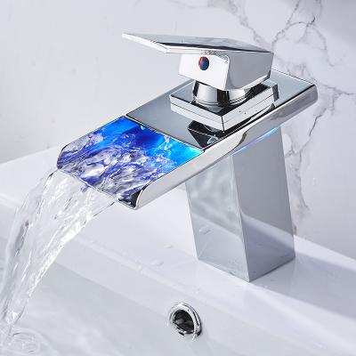 China Metered Faucets Color Copper Luminescent Basin Faucet LED Wide Mouth Waterfall Faucet for sale