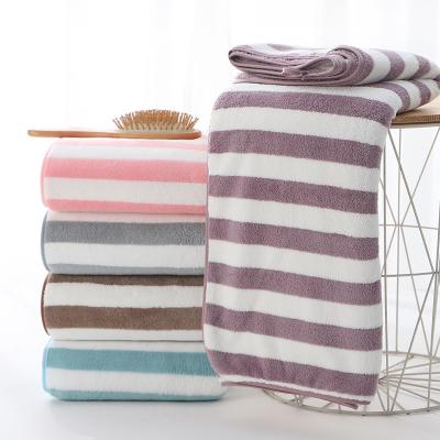 China Household Thickened Striped Coral Velvet Bath Towel for Quick Drying and Absorption for sale