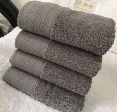 China Soft Absorbent Coffee Thickened Household Baby Cotton Large Towel 70*140cm Rectangle Gray Hotel Bath Towel for sale