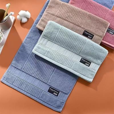 China Cotton Double Sided Piano Stripe Towel with Customized Logo and Child-Proof Labeling for sale