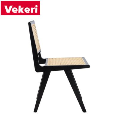 China Minimalist Minimalist Solid Wood Chair Leg Dining Chair Seat is a French Vine Woven Black Dining Chair for sale