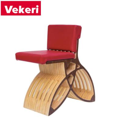 China Modern the back of the seat is covered in a striking red interior while the bottom of the wooden structure is a plywood dining chair for sale