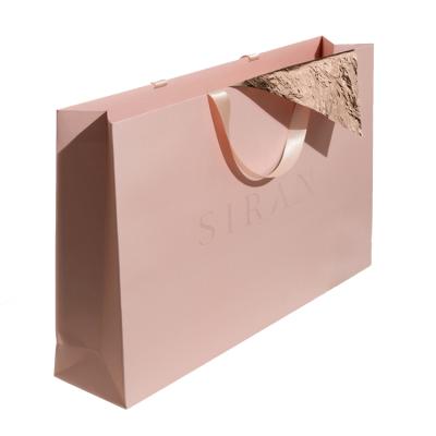 China Recyclable Luxury Custom Logo Garment Gift Apparel Shopping Paper Bag With Ribbon Handle for sale