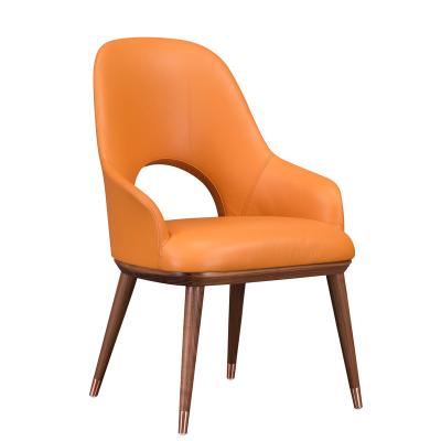 China 2020 Cavity Design Seat Hollow Design High Density Cold Orange Leather Silid Modern Nordic Dining Chairs Foam Treatment for sale