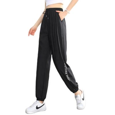 China OEM ODM Ladies Long Pants Summer Breathable Nylon Casual Loose Ice Silk Breathable Sports Pants for sale