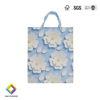 China Customized Size Logo Eco Friendly Folding Coated Paper Bag With Handle for sale