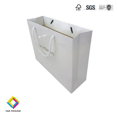 China FSC Recyclable Custom Kraft Gift Paper Bags With Handle For Shopping Bag for sale