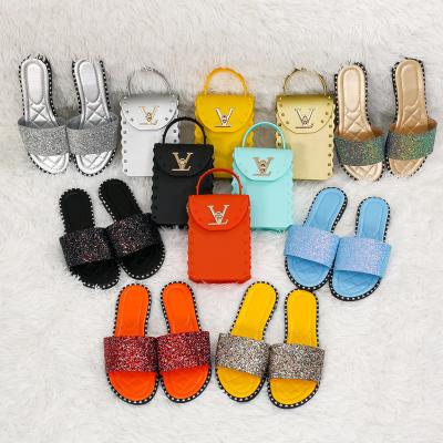 China New 2021 High Quality Mini Coin Purse One-Shoulder Diagonal Bag Chain Jelly Bag Pvc Mobile Phone Purse and Rhinestone Beach Slippers Set for sale