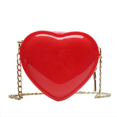 China Hot Selling Eco-friendly Clip Handbags Mini Heart Shape Colorful Small Jelly Shoulder Bags For Women for sale