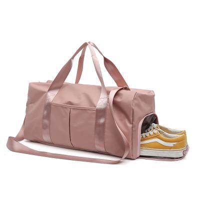 China Private label multifunctional custom pink logo women traveling duffel bag with shoe compartment for sale