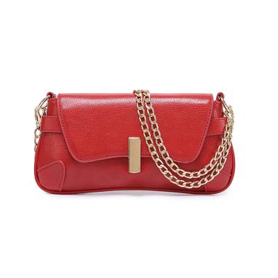 China Bohemian hot sale popular armpit pocket embossed leather handbags for women fashion metal strap chain shoulder bag for sale