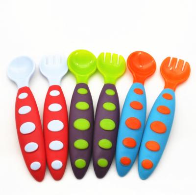 China Child Training Spoon Sustainable Safety PP Material + Tape Baby Fork And Feeding Spoon Set for sale