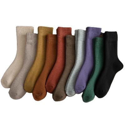 China Sporty in winter running thick combed cotton calcetines comfortable fuzzy wool casual floor woman knit socks for sale