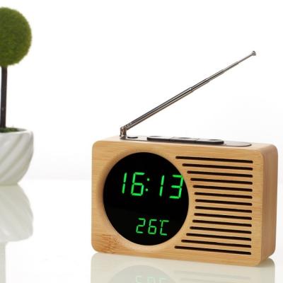 China PORTABLE horizontal bamboo wooden mute radio retro green light mirror strip electronic clock for sale