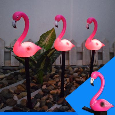 China Garden Flamingos A Modern Outdoor Landscape Lamp Courtyard Garden Lights Clog Three Solar Environmental Protection Decoration for sale