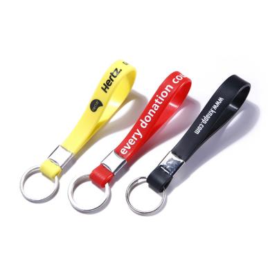 China Modern Gifts Items Branding Custom Rubber Band Key Ring With Charm for sale