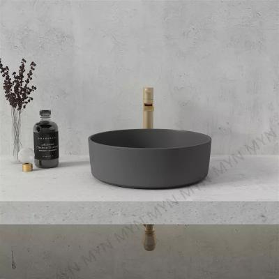 China Modern Art Design Concrete Hand Wash Round Shape Hotel Table Top Modern Sink for sale