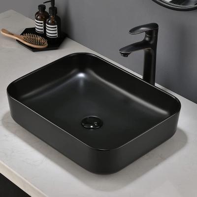 China Fashion Modern Ceramic Hand Wash Basins Black Matte Marble Above Counter Vanity Cabinet Toilet Sink Bathroom Sink for sale