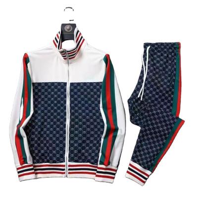 China Breathable Hot Sale New Design 2 Piece Unisex Tracksuits Fashion Man Tracksuits for sale