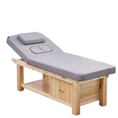 China Modern Most Popular Solid Wood Four Leg Facial Table Massage Beauty Salon Bed for sale