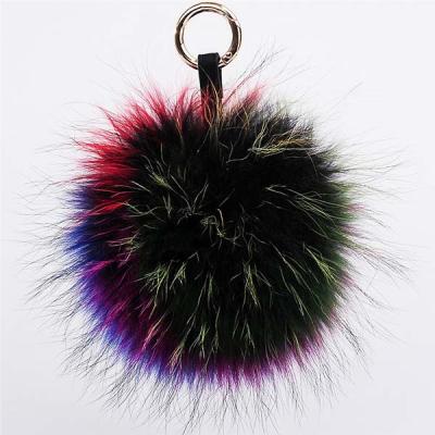 China 15cm big fur balls real raccoon fur pompom fur keychains furry fluffy fluffy bag charm with keychains for sale