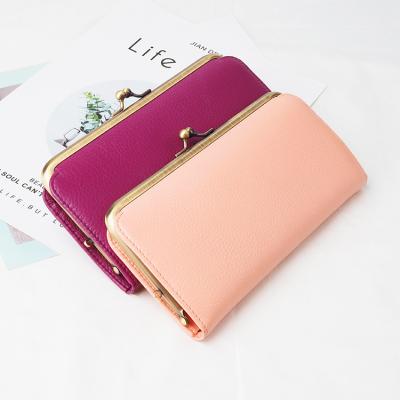 China Waterproof 2021 China Wholesale Cheap Clasp Wallets For Women Vintage Wallets Women for sale