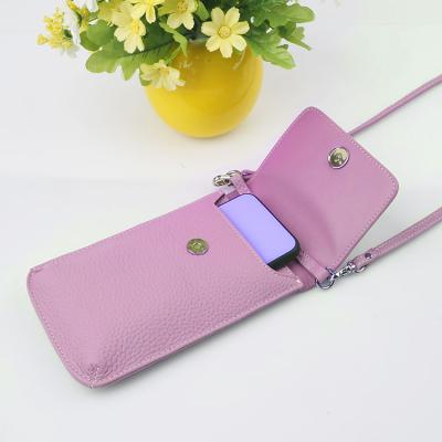 China Simple design portable purple color genuine pebble leather phone bag, luxury fashion phone bag for sale