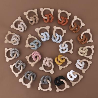 China Super High Quality Kids Teething Fun Silicone Baby Teether Pain Calming Baby Hand Grip Rattle Baby Molar Toy for sale