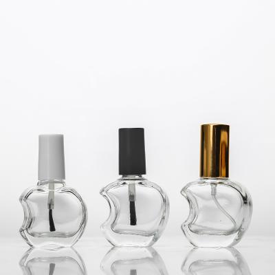 China 2022 cosmetics the latest black cap nail polish apple shape glass cosmetic bottle of packaging for sale