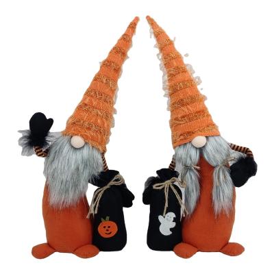 China New High Quality Knitted Halloween Gnome Ornaments Spider Bat Holding Faceless Dolls Shrink Gnomes For Halloween Party Layout Decorations for sale