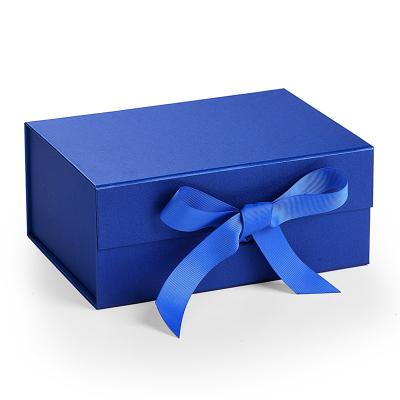 China Recyclable Custom Folding Packaging Magnetic Paper Foldable Elegant Gift Boxes With Ribbon Closure for sale