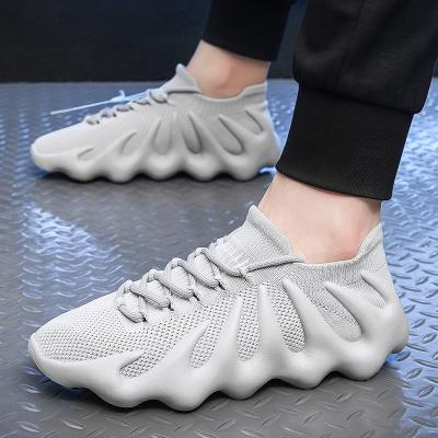 China Fashion Trend Flight Knit Casual Sport Shoe Women Breathable Tennis Shoes Fashion Skateboard Shoes Man for sale