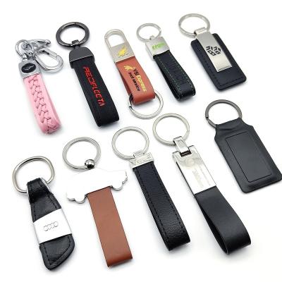 China Best Portable Wholesale Souvenir Gifts Custom Engrave Custom Colored Genuine Leather Metal Keychain Key Chain for sale