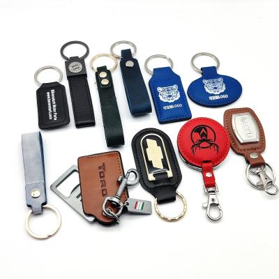 China Supermarket Use Logo Designer Metal Car Key Wholesale Custom Tag Black Genuine Leather Key Chain for sale