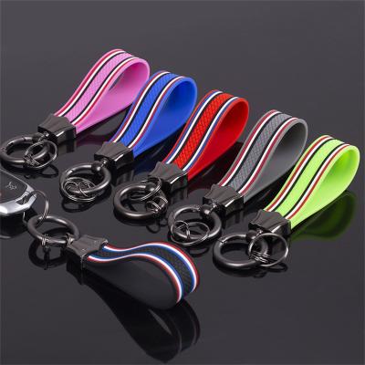 China Supermarket Use Personalized Logo Custom Metal Key Ring 360 Degree Rotating Cheap Silicone Wristband Wristband Bar Rubber Key Chain for sale